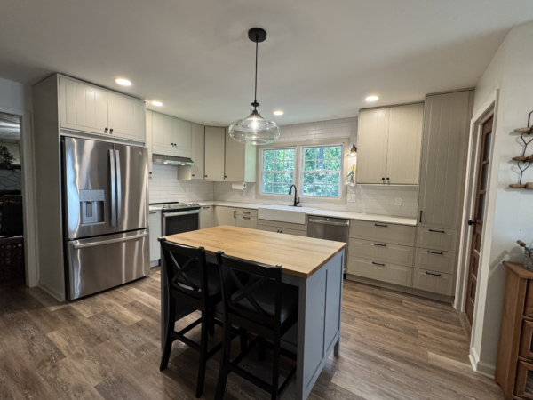 Tile backsplash in a remodeled kitchen with IKEA cabinets